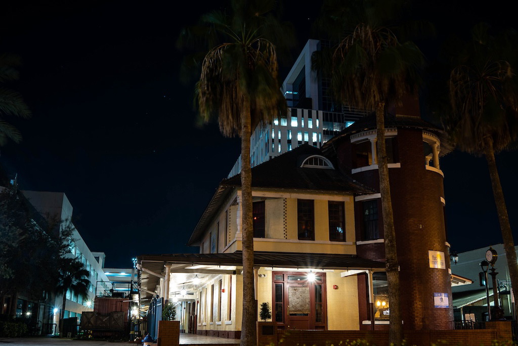 Nighttime view of the Old Orlando Train Depot in Orlando, FL